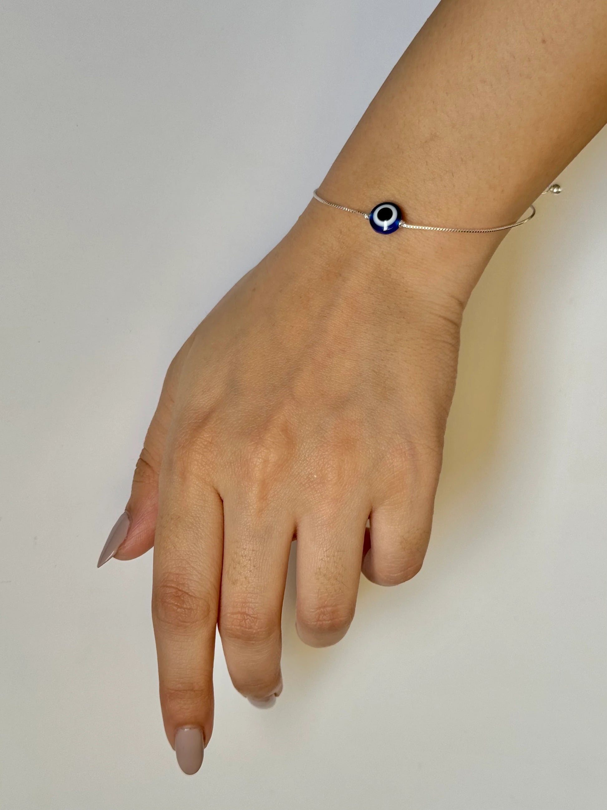Silver evil eye bracelet for protection and luck