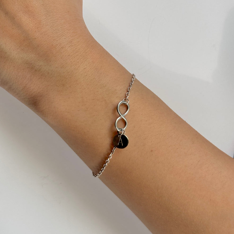 Infinity initial bracelet in silver 