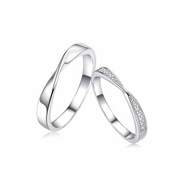 A pair of Mobius Moissanite sterling silver couple rings 